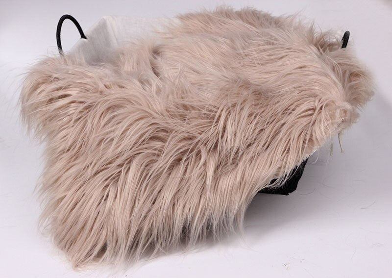 Luxurious faux fur backdrop in white for infant photoshoots, baby accessory