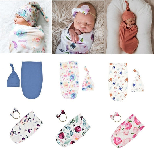 Soft grey newborn swaddle sleeping bag and matching knot hat set for baby comfort