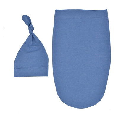 Blue newborn sleep sack and headband, providing warmth and security for tiny babies