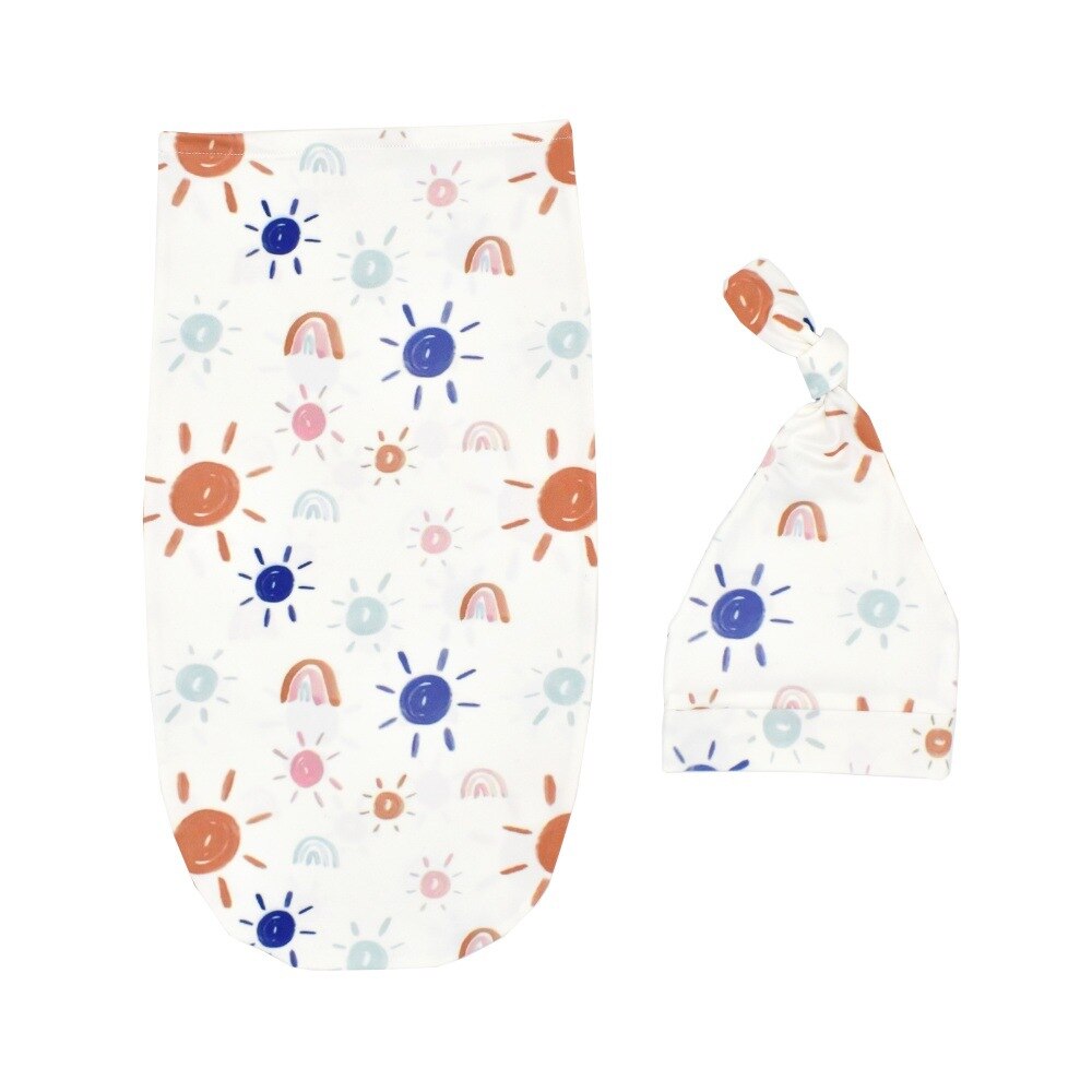 White newborn swaddle sleeping bag with a cute bow hat, perfect photo prop for babies