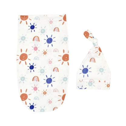 White newborn swaddle sleeping bag with a cute bow hat, perfect photo prop for babies