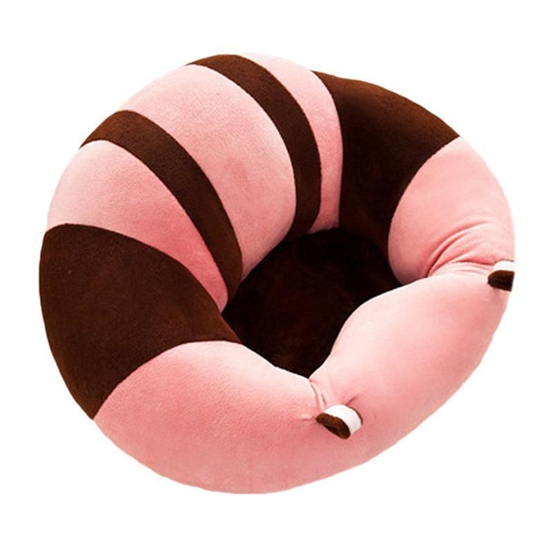 Top-down view of an infant support seat, illustrating the spacious leg openings and secure design