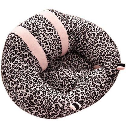 Group of animal support seats for babies, showcasing different characters like elephants and lions