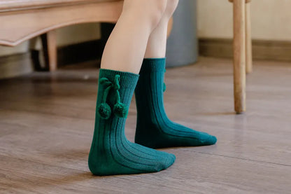 Baby boy's attire featuring soft knit knee-high socks, stylish & warm.