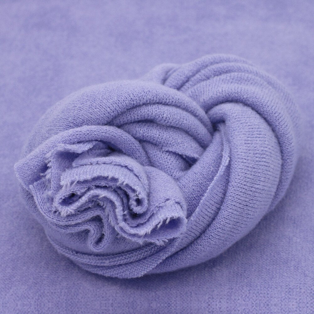 Textured cream knitted baby wrap, a must-have baby accessory for newborn photography props.