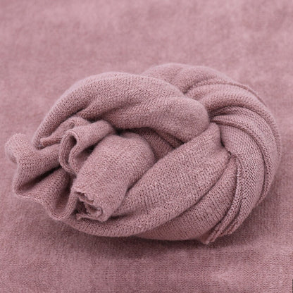 Infant comfort knitted blanket wrap for baby photography shoots, also useful as a studio backdrop.