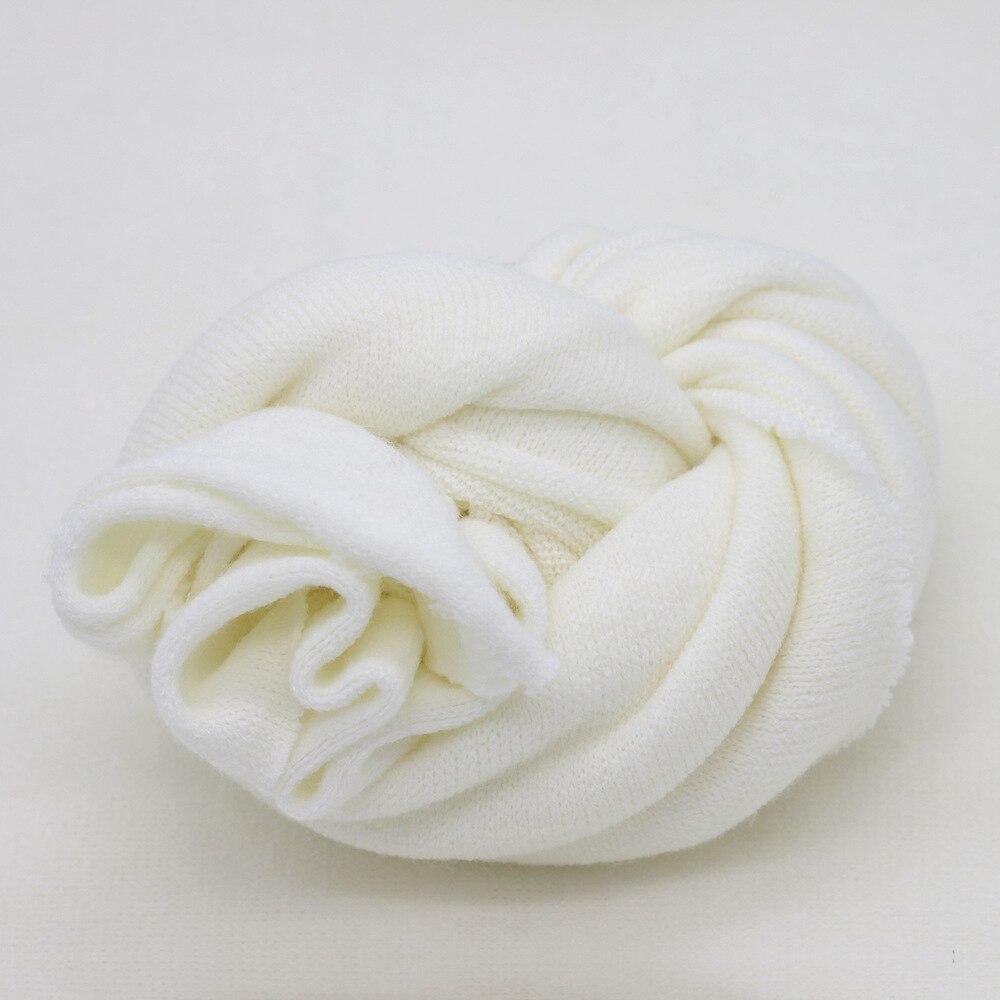 Close-up of a handmade knitted baby blanket, suitable for newborn photography or baby decor wrap.