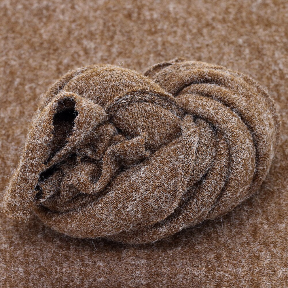 Soft cotton knitted baby wrap, essential newborn photography prop for cozy infant comfort.