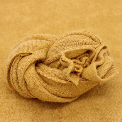 Cream baby blanket, a knitted wrap prop for professional newborn photography and baby's backdrop.