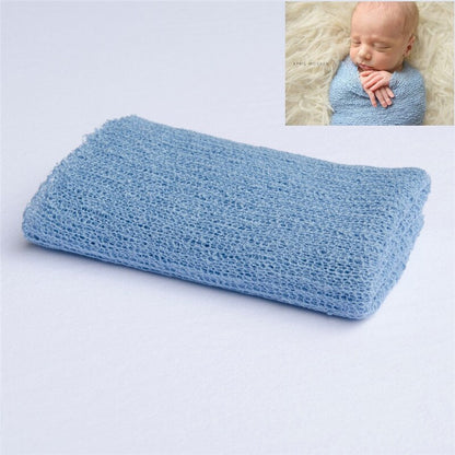 Lightweight knitted baby swaddle wrap, ensuring comfort during newborn photography