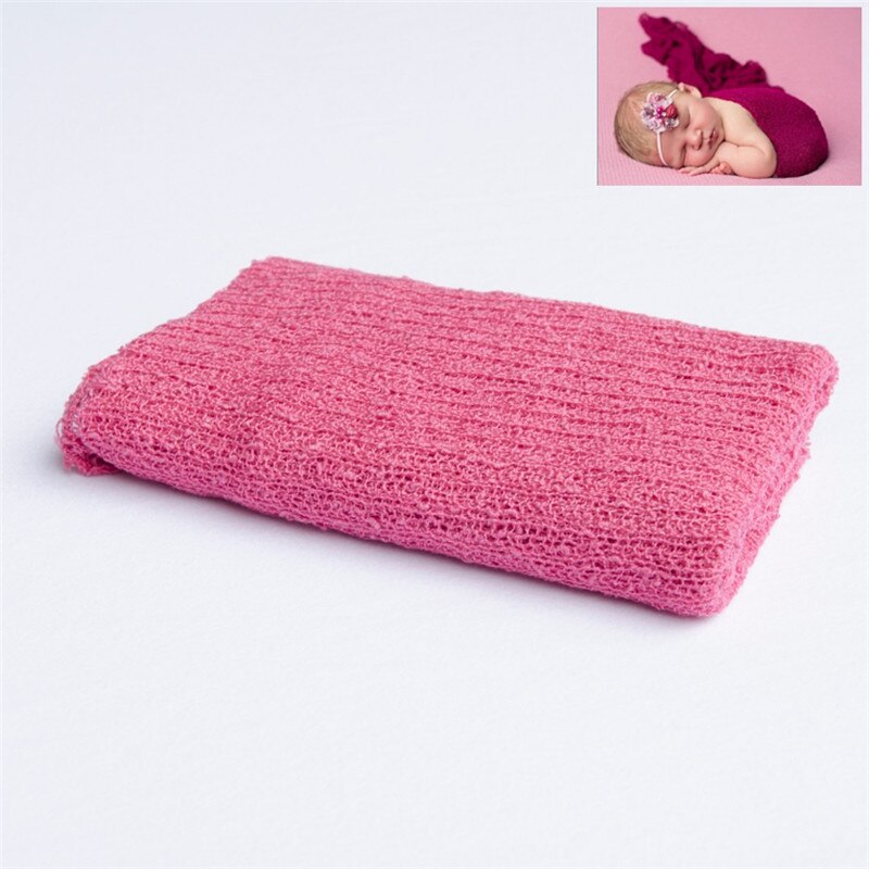 Baby accessory: plush knitted blanket, perfect for creating dreamy newborn photos