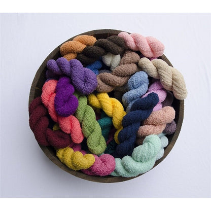 Artistic knitted baby photography blanket, creating beautiful backdrops for infants