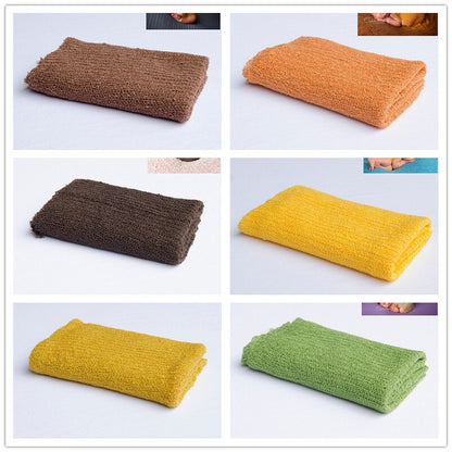 Knitted infant wrap, a key accessory for memorable and tender baby photoshoots