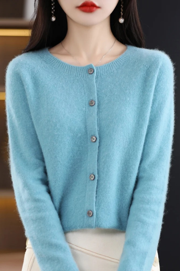 Elegant long women's cardigan with button front, versatile outerwear for fashion-forward looks.