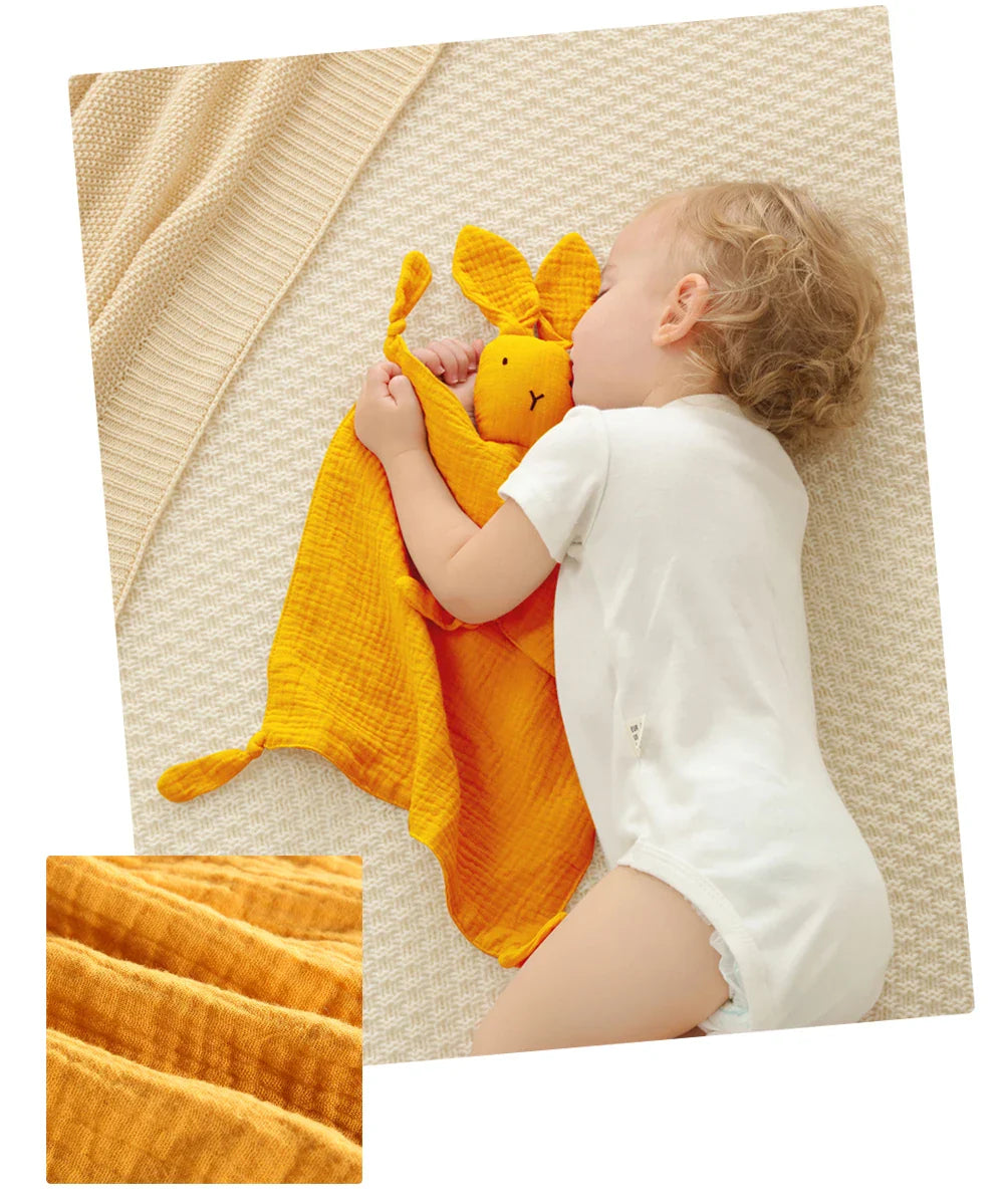 Soft muslin baby comfort towel set in neutral colors, perfect for newborn essentials and baby care.