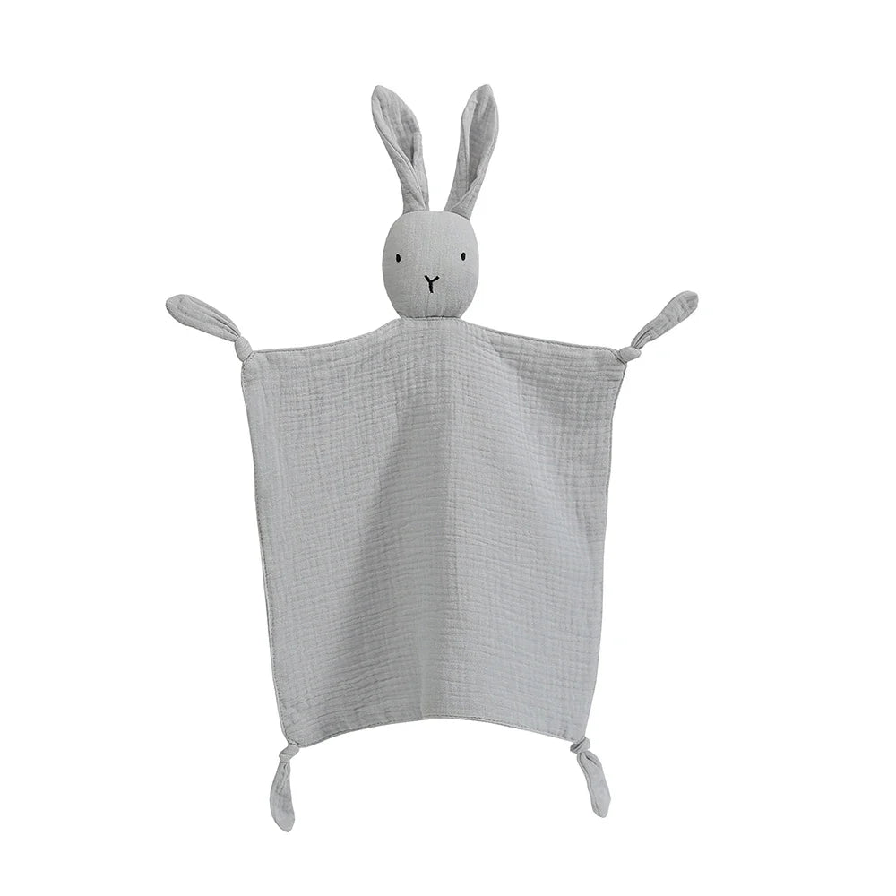 Adorable baby wrapped in a soft muslin comfort towel after bath time, highlighting its gentle touch.