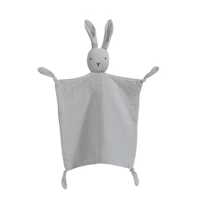 Adorable baby wrapped in a soft muslin comfort towel after bath time, highlighting its gentle touch.