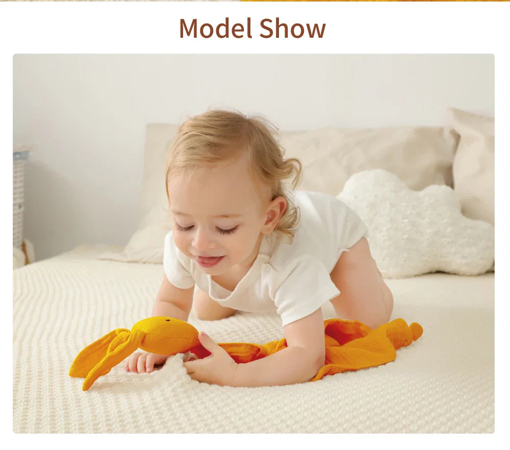 A cozy muslin baby comfort towel, providing gentle absorbency for newborns and toddlers.