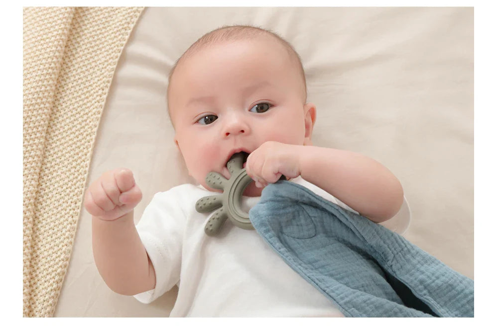 Soft white muslin baby comfort towel, a classic and indispensable item for baby care.