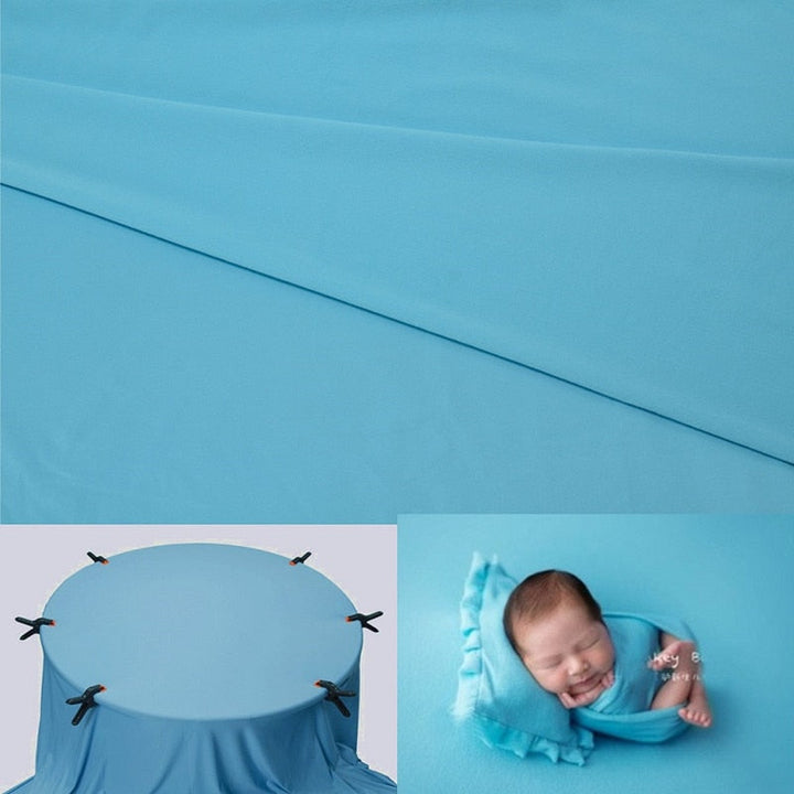 Complete newborn photography set: wrap, blanket, and natural wood backdrop