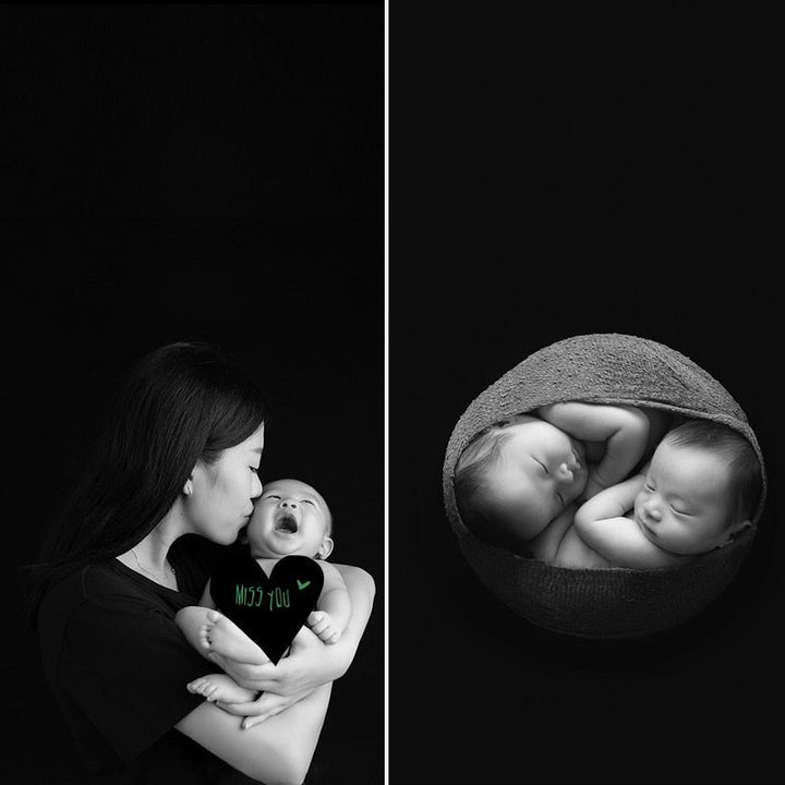 Infant photoshoot prop: cozy baby wrap and smooth, solid colored backdrop