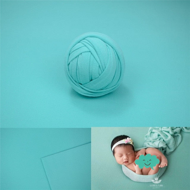 Full view of newborn photoshoot wrap and backdrop kit, ideal baby shower gift