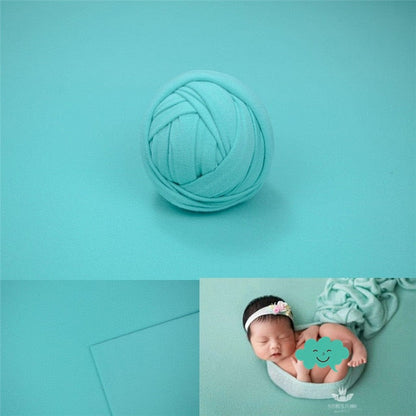 Full view of newborn photoshoot wrap and backdrop kit, ideal baby shower gift