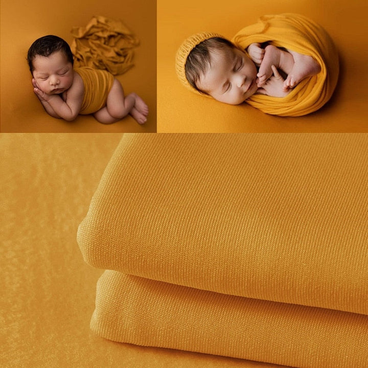 Luxury newborn photography wrap in cashmere blend with a silk-like backdrop