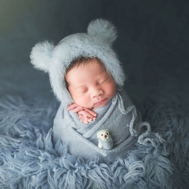 Cotton polyester blend newborn swaddle blanket, hat, and doll – essential baby photography props.