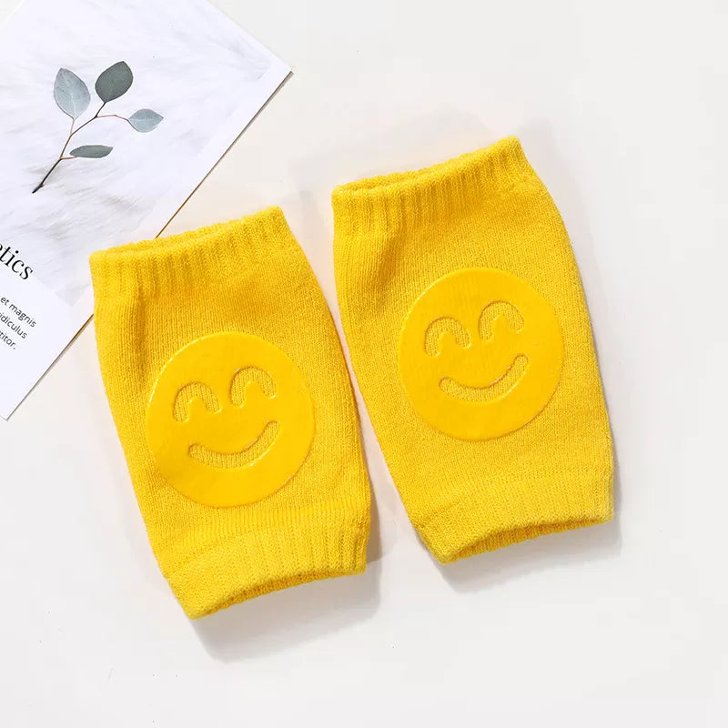 Stack of assorted soft knee sleeves for toddlers, providing bulk options for baby safety gear.