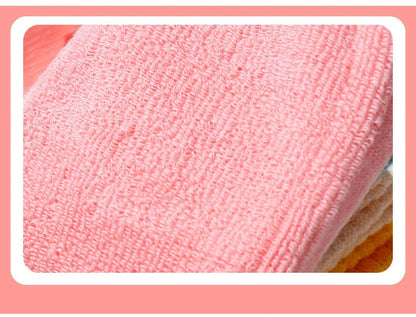 Infant exploring outdoors with durable baby crawling knee pads, protecting from rough surfaces.