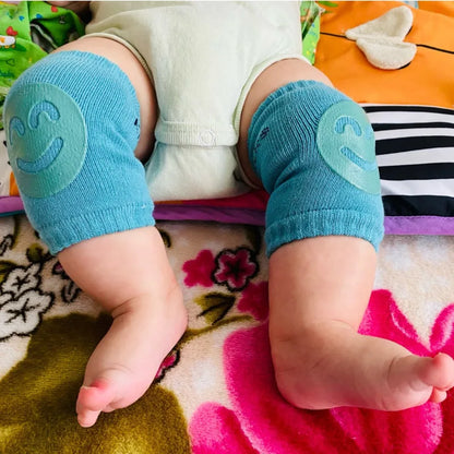 Unisex gray crawling protector knee sleeves, ensuring comfort & safety for baby's delicate knees.