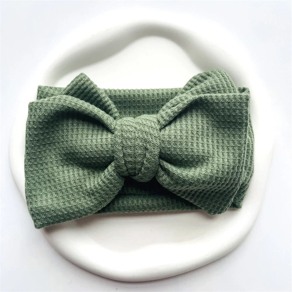 Grey baby girl's cotton bow headband, a versatile toddler accessory