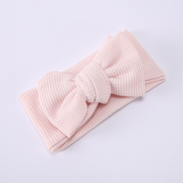Cute red elastic bow headband for baby girls, a charming newborn gift