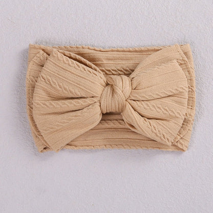 Green elastic bow headband for baby girls, soft and comfortable infant accessory