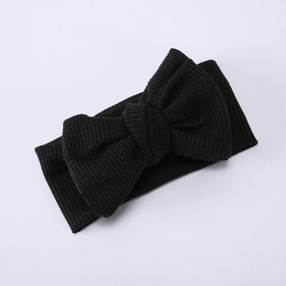 Blue elastic bow headband for baby girls, comfortable infant fashion accessory