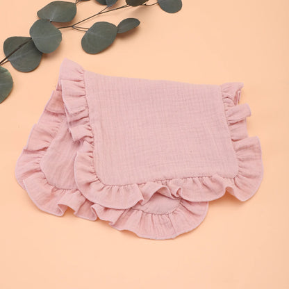 Display of various colored muslin cotton gauze burp cloths with ruffle edges, perfect for baby shower gift.