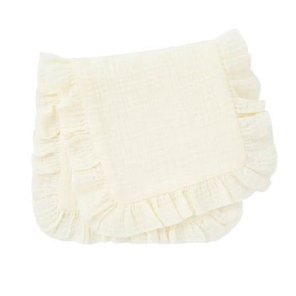 Close-up of the elegant ruffle edge design on a soft white muslin baby burp cloth, comfortable.