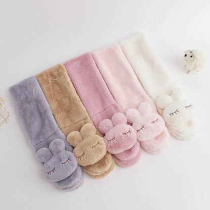 Soft pink plush bunny scarf for children, perfect for warm winter wear and baby clothing.
