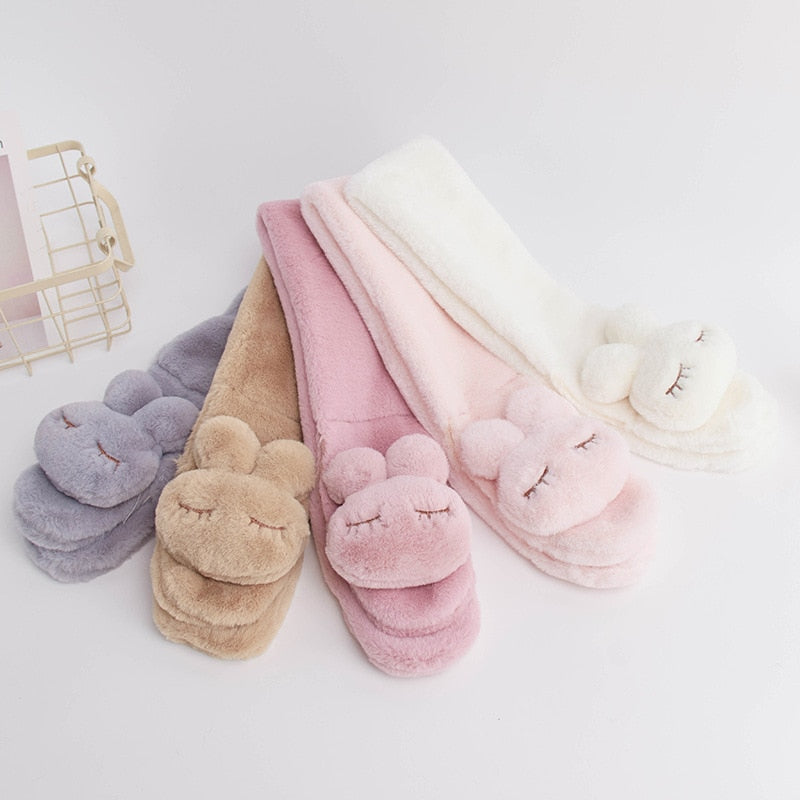 Gray plush bunny scarf, a soft and warm winter accessory for toddlers and young children.