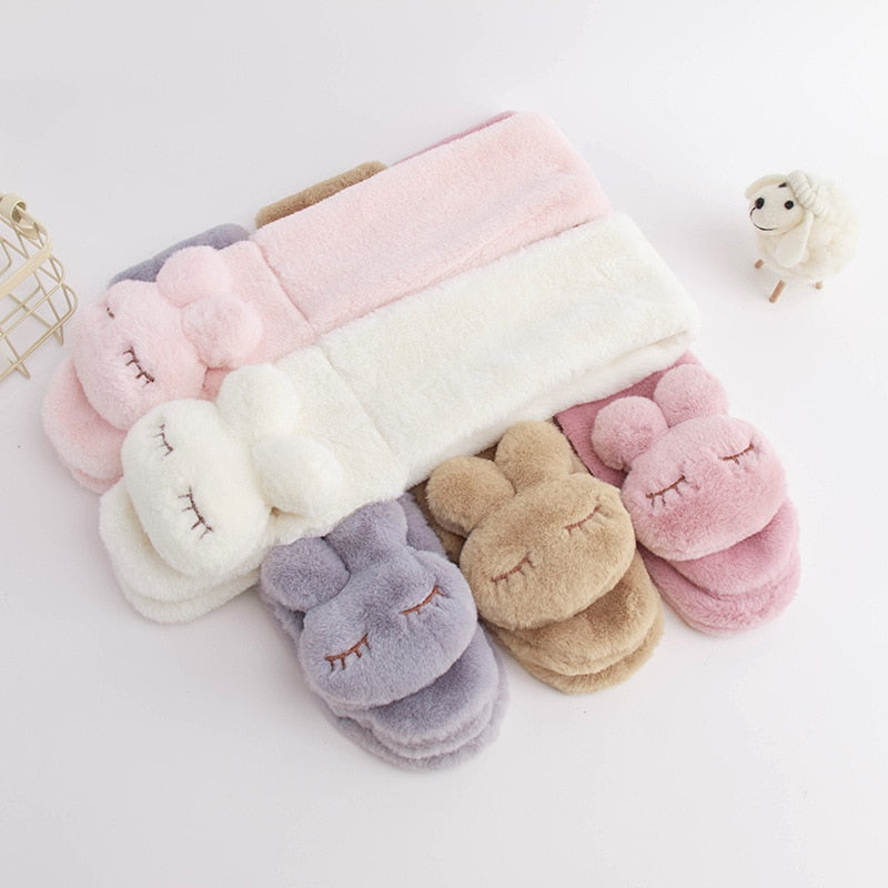 Children's warm pink plush bunny scarf, featuring a playful bunny design for winter comfort.