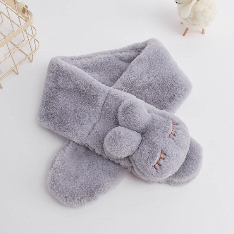 Kids' winter pink plush bunny scarf, a warm and soft accessory for ultimate comfort.