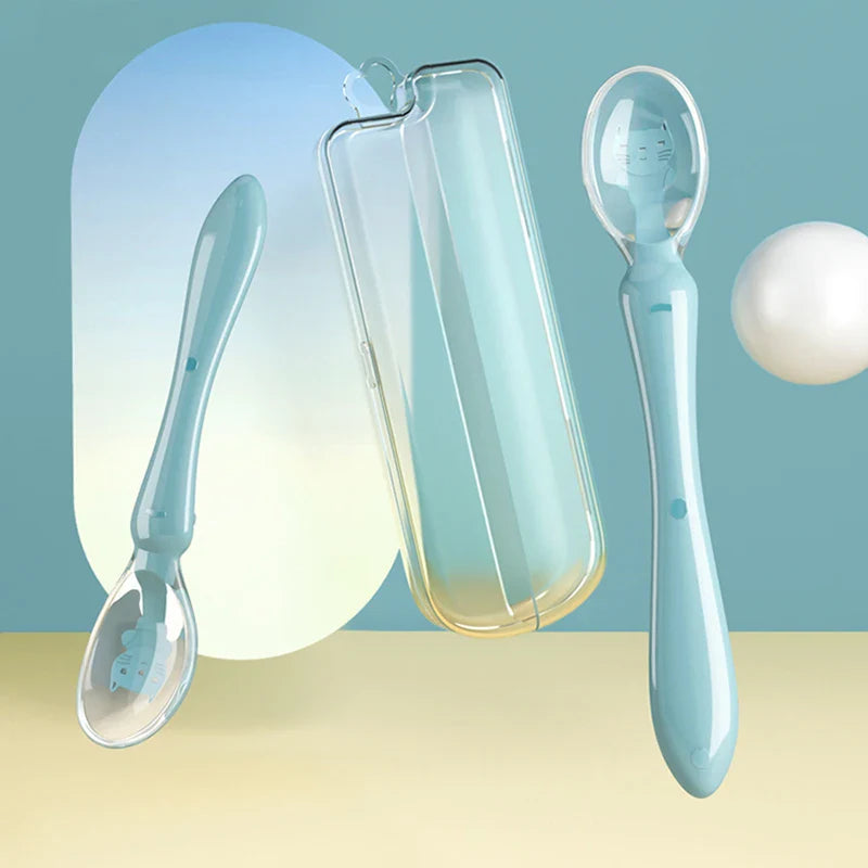 Assortment of BPA-free silicone baby spoons in vibrant candy colors on a white background