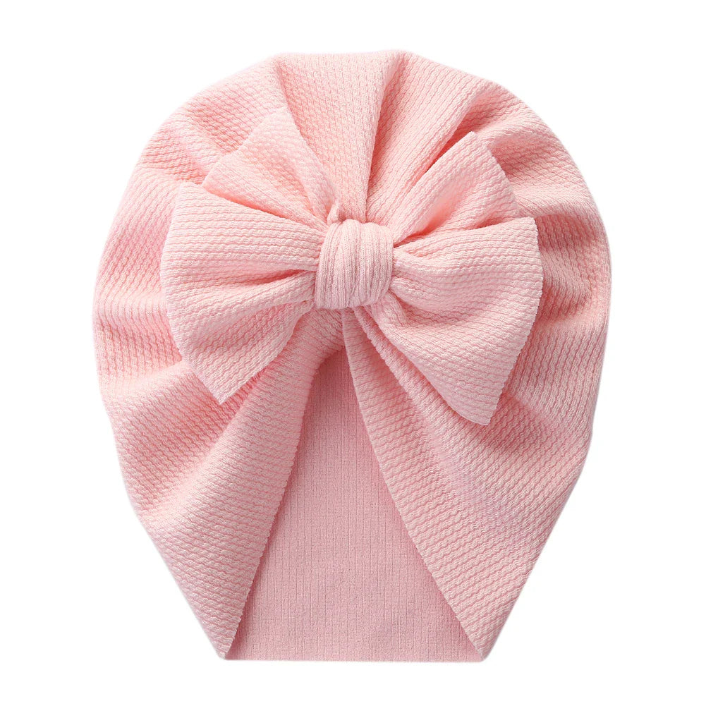 Cute gender-neutral baby topknot turban, soft polyester infant hat, newborn accessory