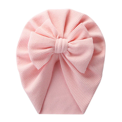 Cute gender-neutral baby topknot turban, soft polyester infant hat, newborn accessory