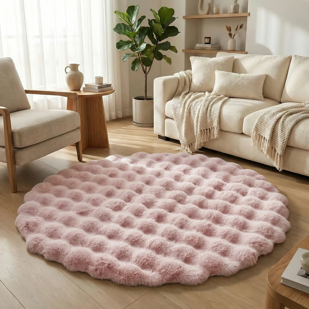 Close-up of a soft tufted round plush area rug, showcasing the luxurious texture and wave pattern. Cozy home decor.