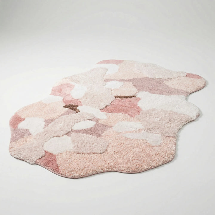 Plush Flowique sculpted area rug featuring elegant wave design. Soft, nature-inspired decor for bedrooms & living rooms.