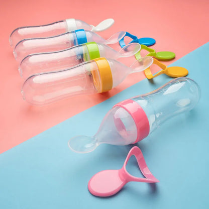 Silicone baby bottle with soft spoon, designed for comfortable solid introduction and baby care