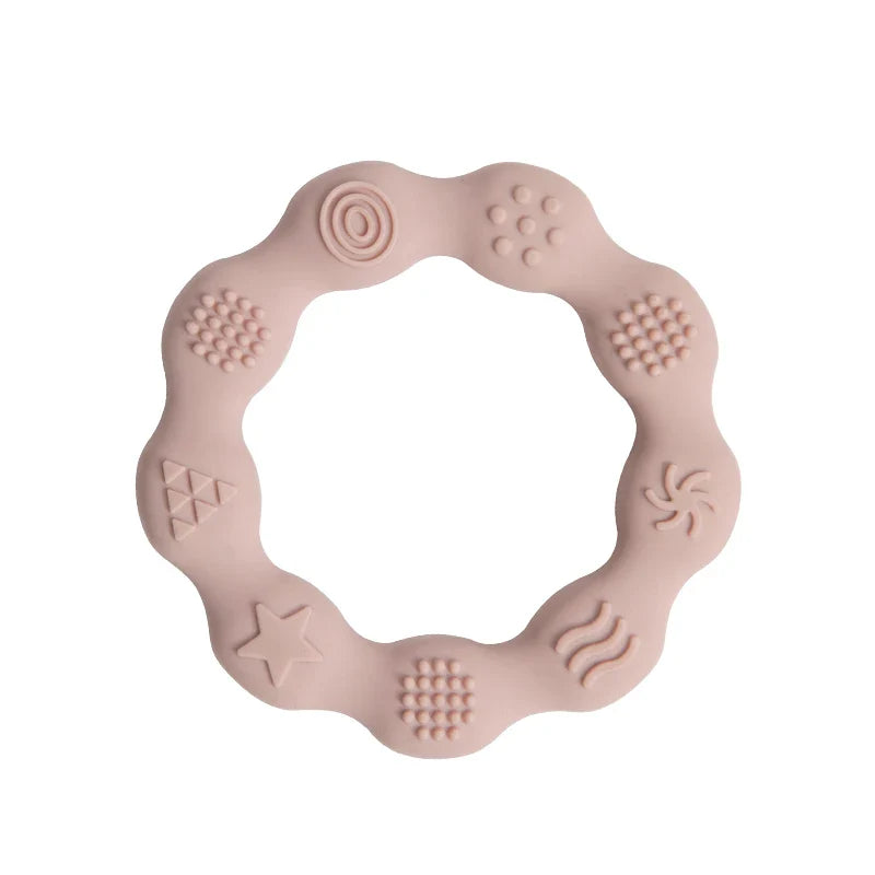 Portable silicone teether for on-the-go relief, easily attaches to stroller or car seat