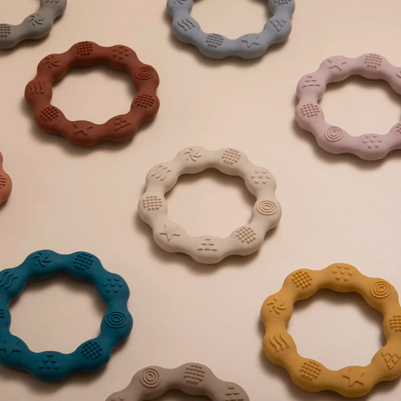 Ergonomic baby teether, food-grade silicone for teething relief and jaw development